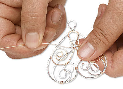 Wire wrapping shaped wire